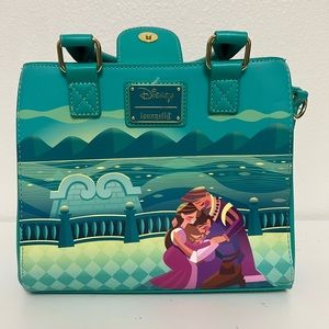 Loungefly Tangled Rapunzel Castle Glow in the Dark Crossbody Bag.